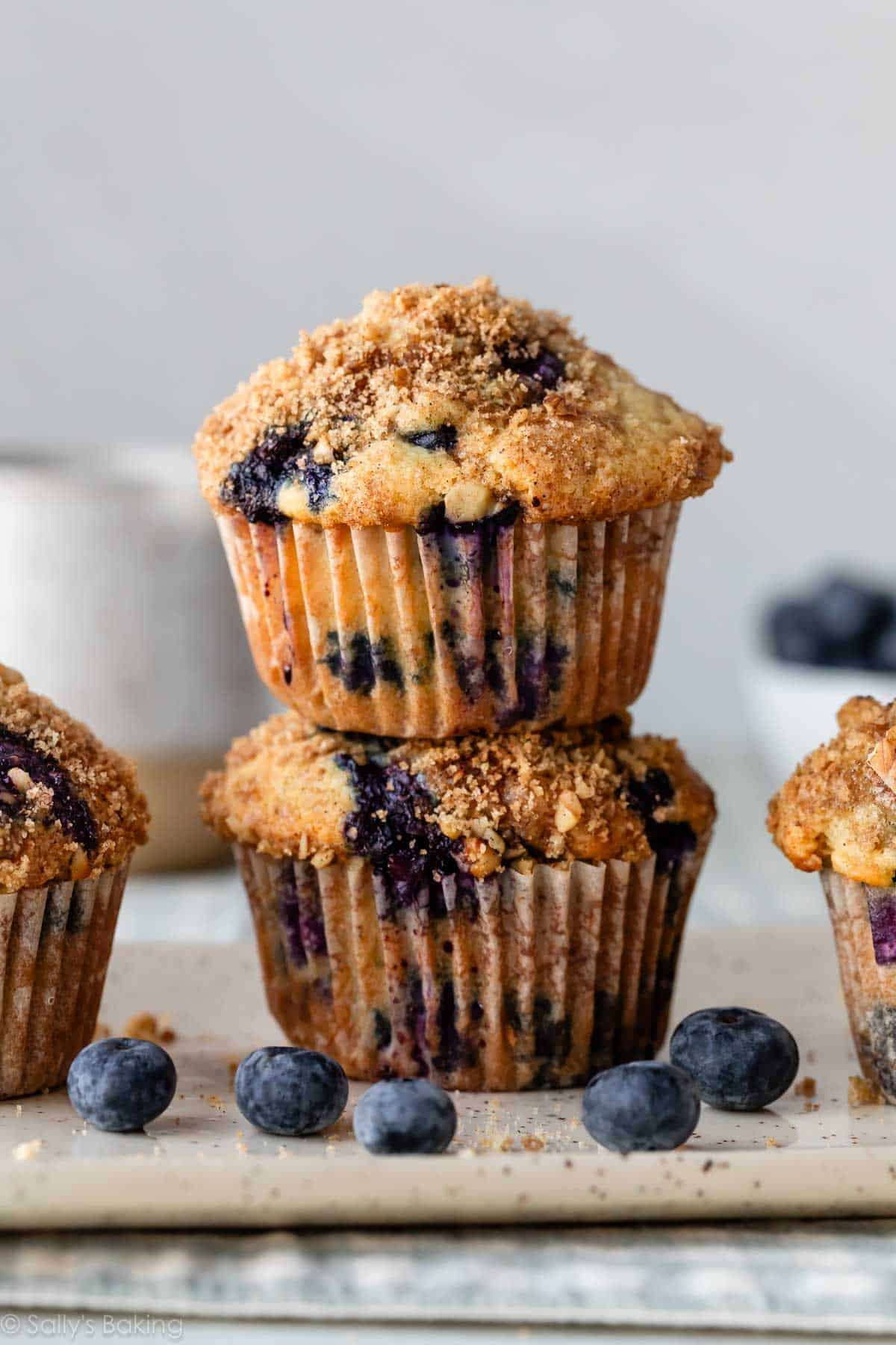 stack of 2 blueberry muffins.