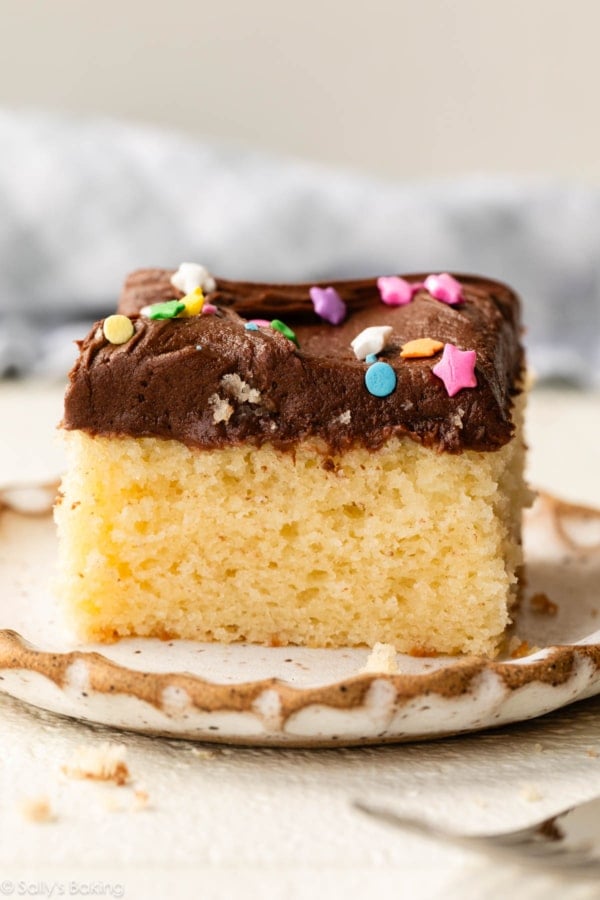 yellow sheet cake slice on plate.