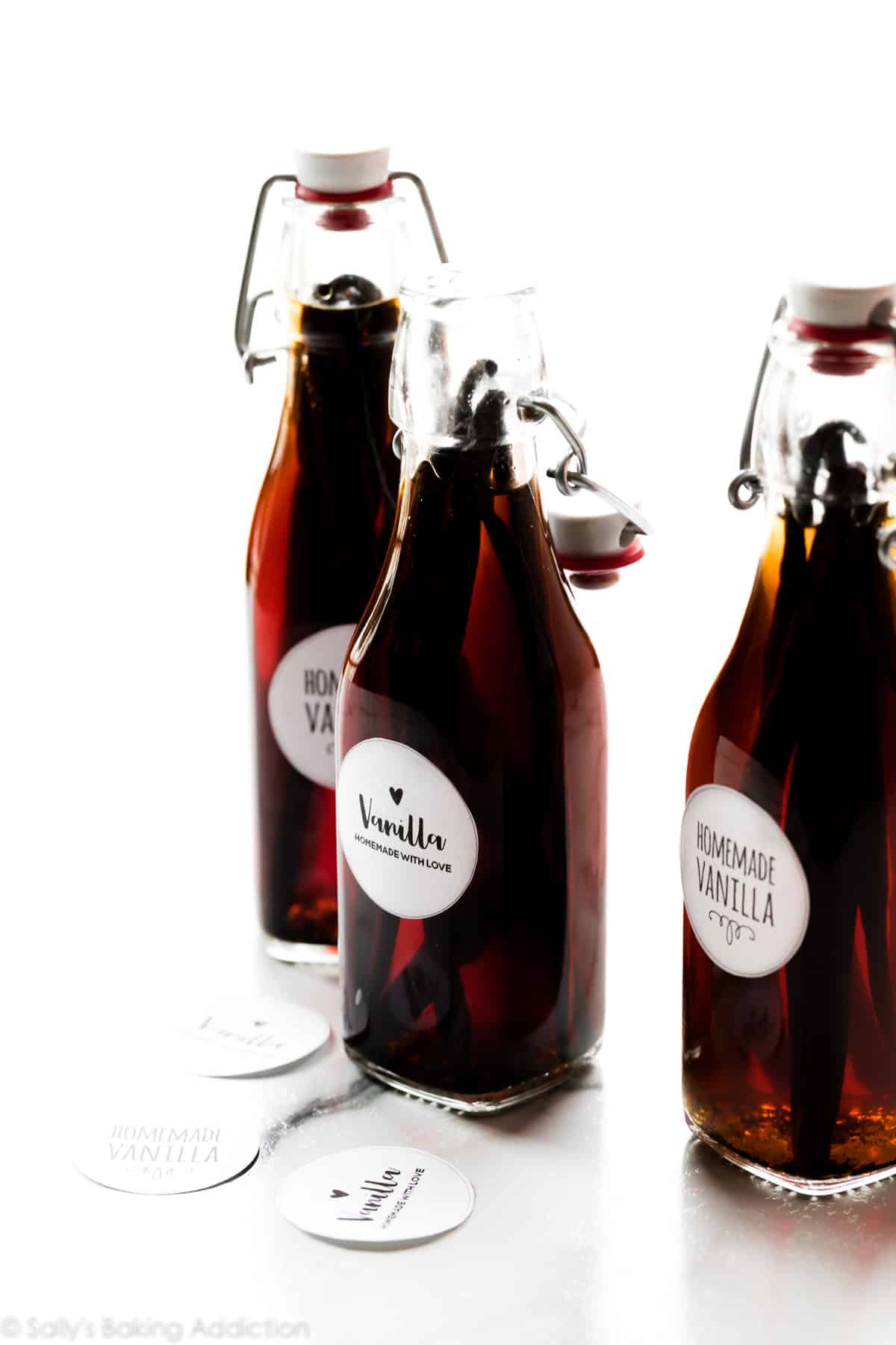 homemade vanilla extract in glass bottles