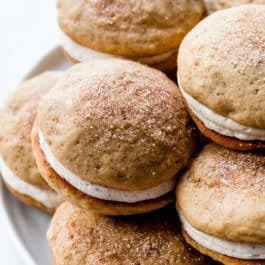 apple cinnamon spice whoopie pies on a plate