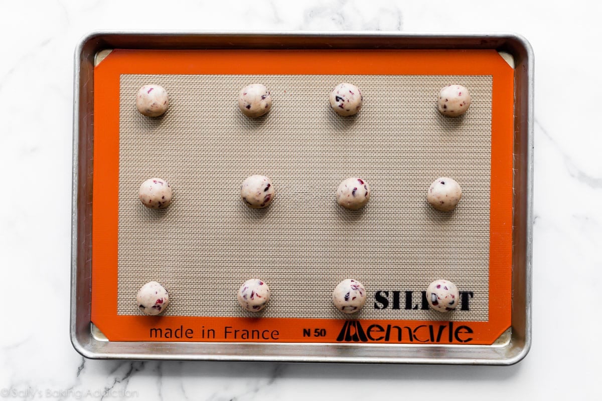 cranberry spice cookie dough on baking sheet