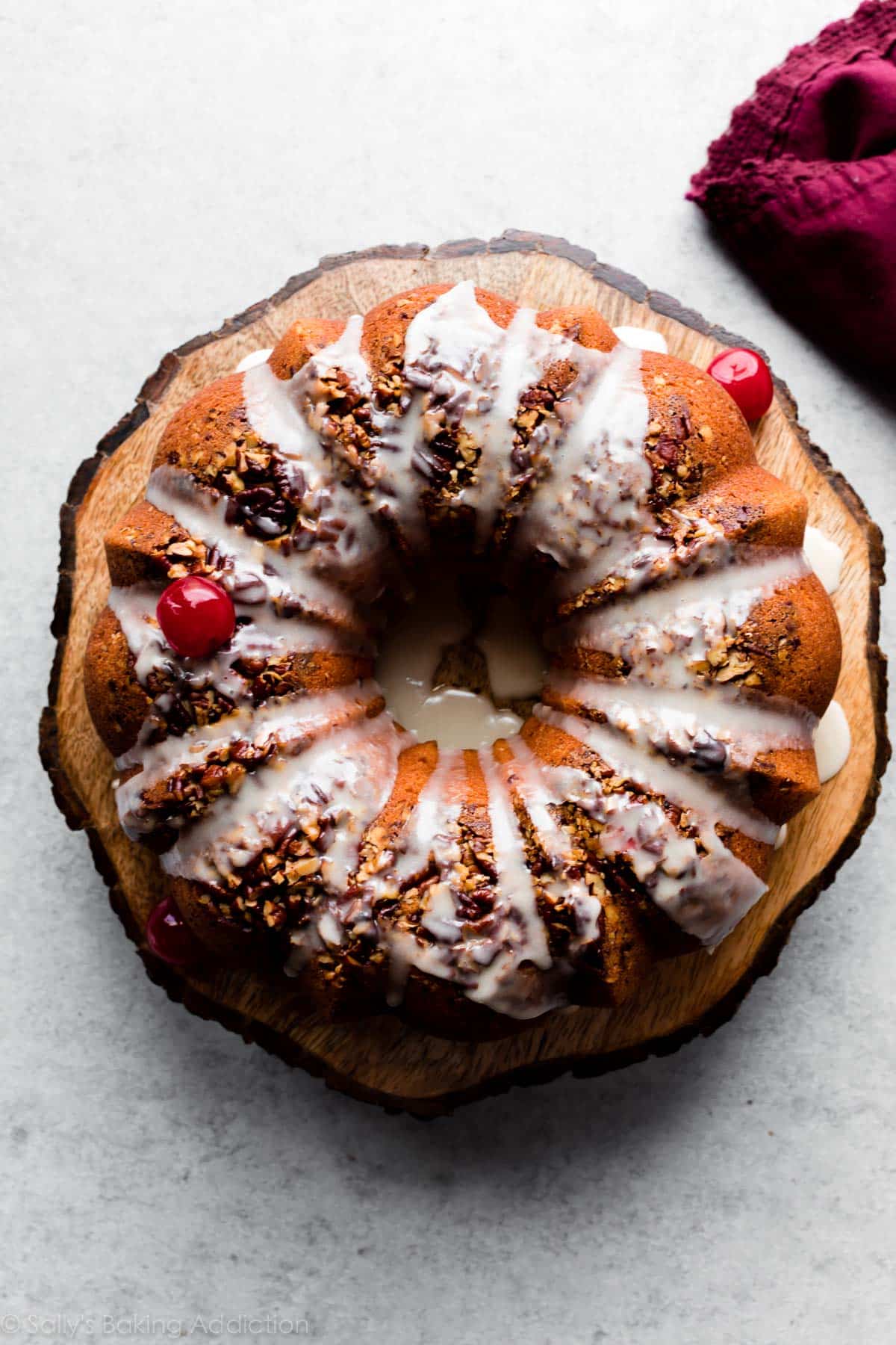 rum cake on wood cake stand