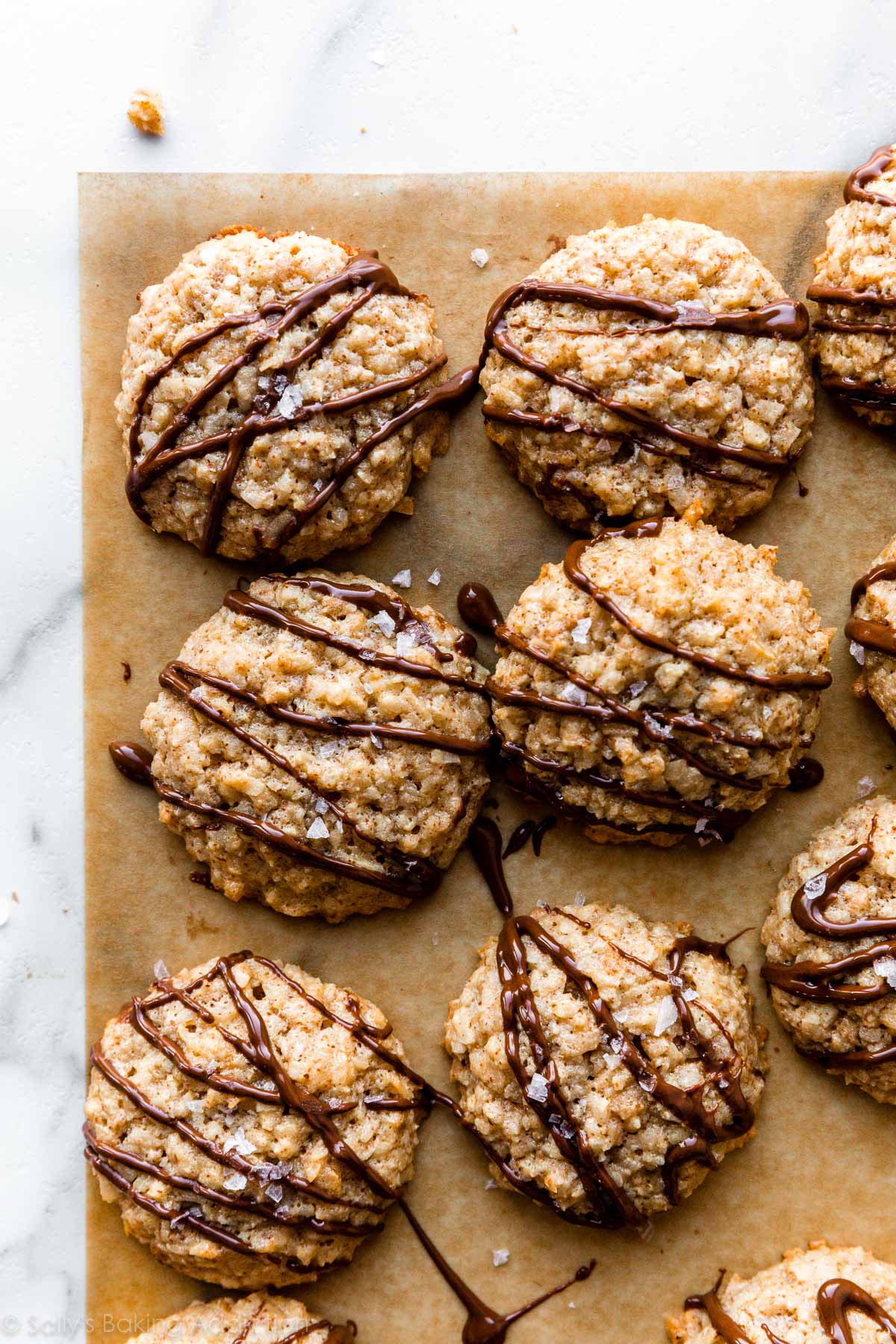 gluten free almond butter coconut macaroons with chocolate drizzled on top