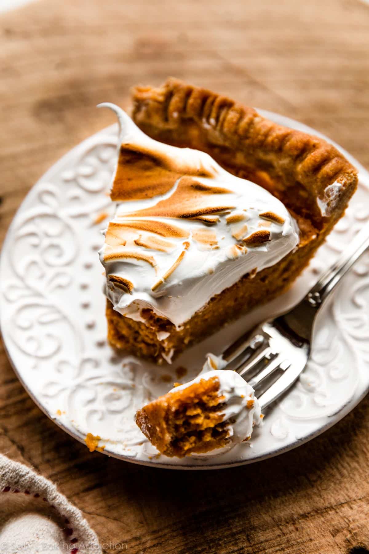 slice of bourbon sweet potato pie with meringue topping