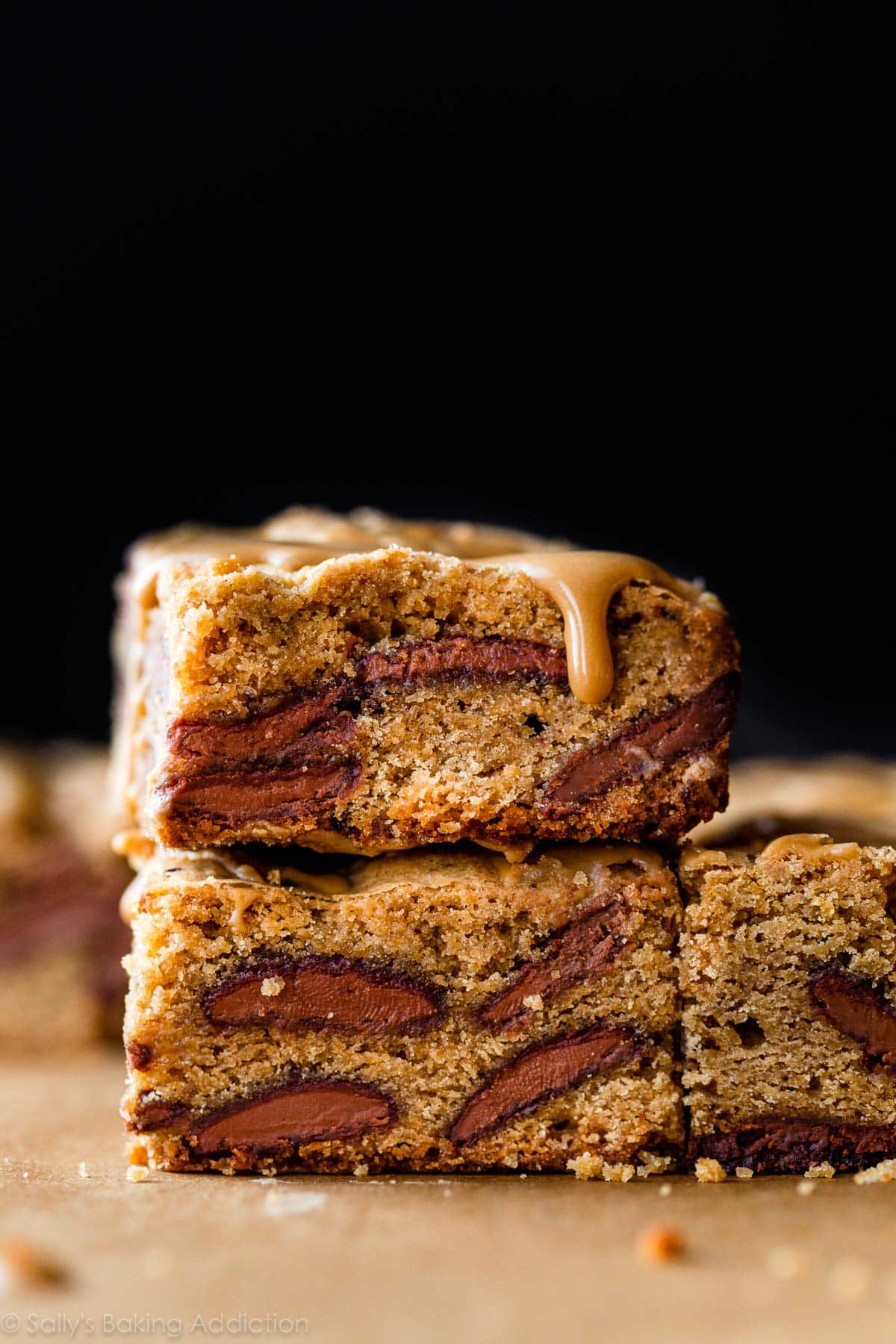 two milk chocolate mocha blondies stacked together
