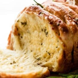 close-up photo of garlic rosemary pull apart bread loaf