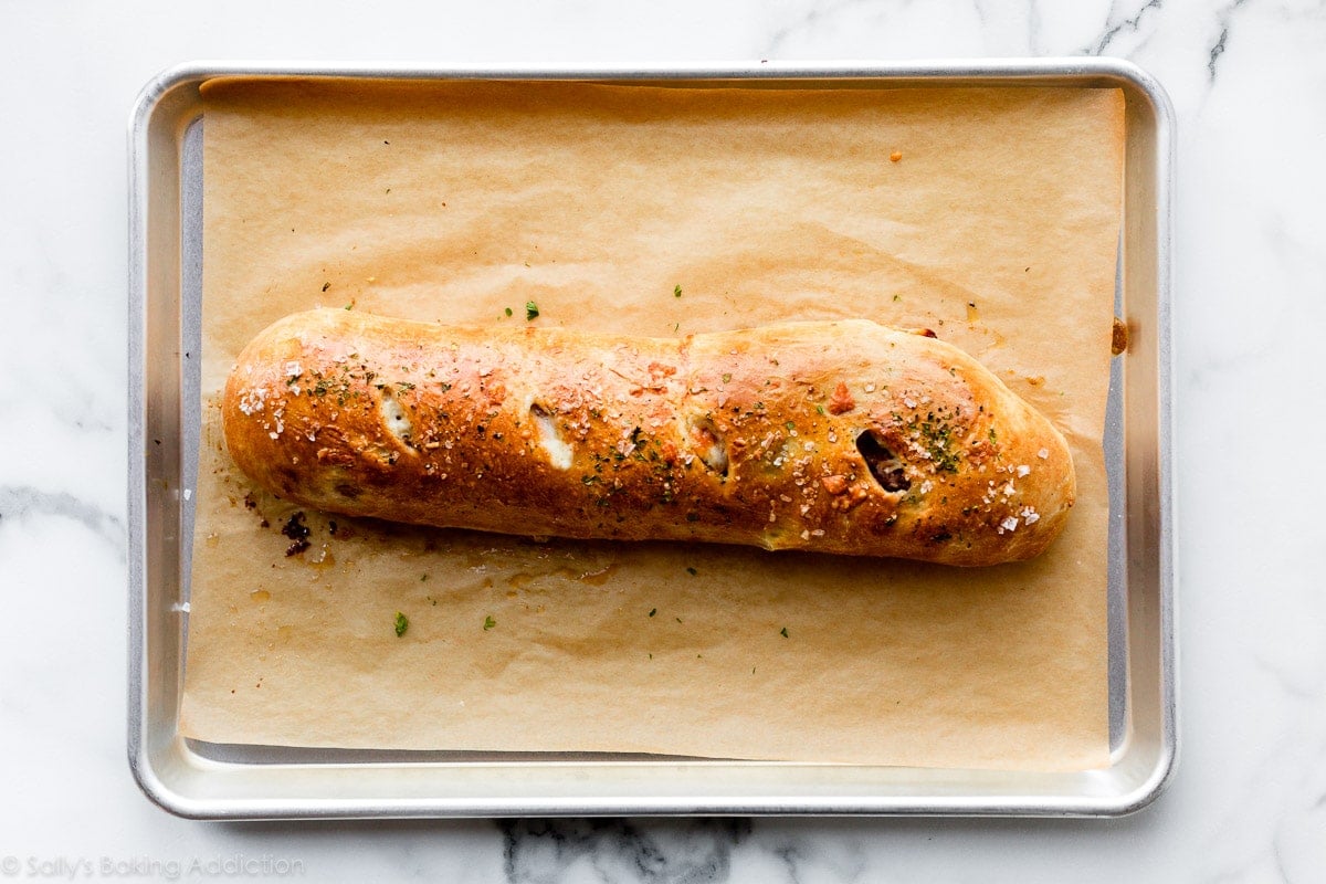 baked stromboli on baking sheet