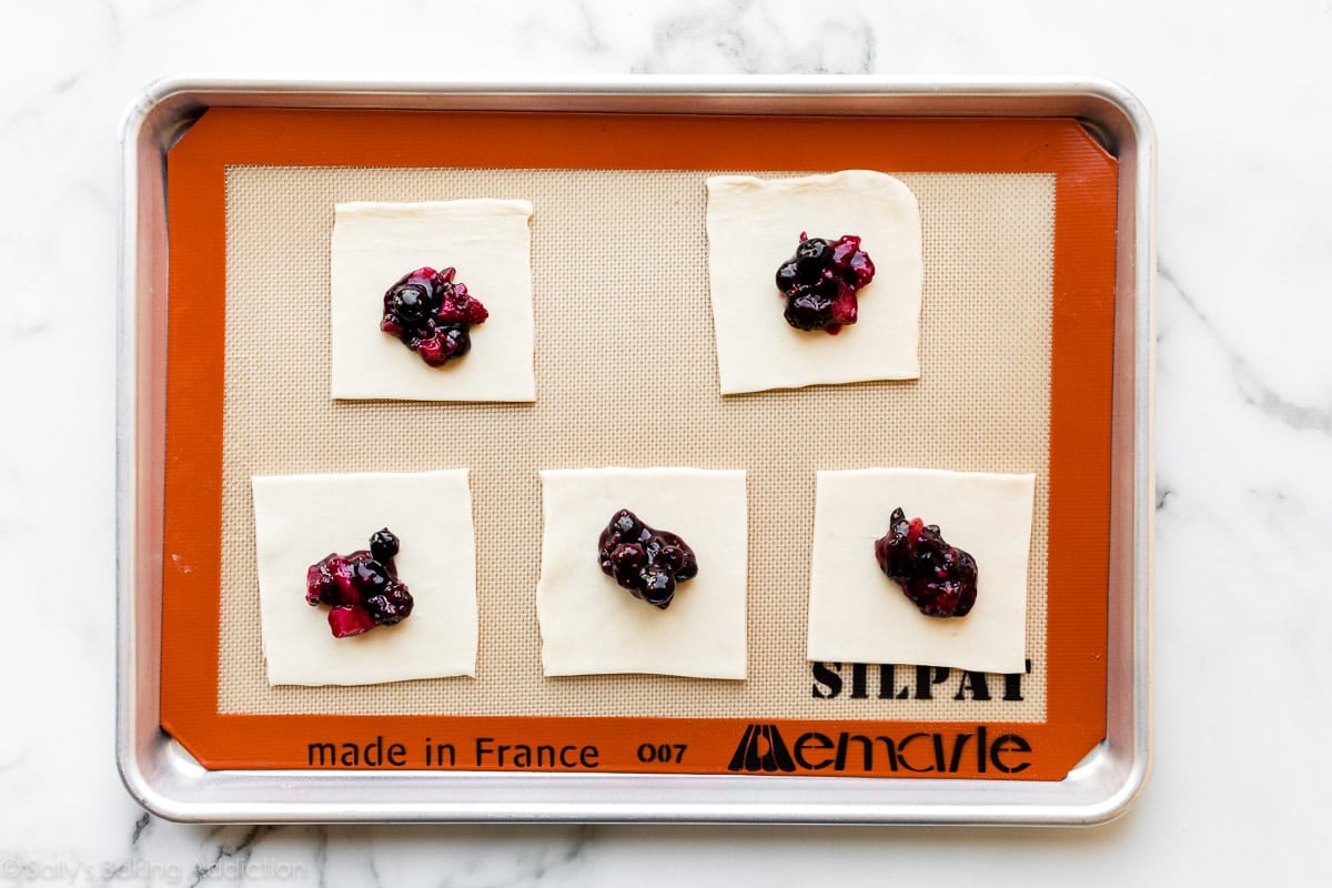 mixed berry filling on pastry squares