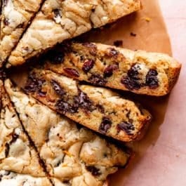 triangle shaped blondies with dark chocolate and dried cranberries