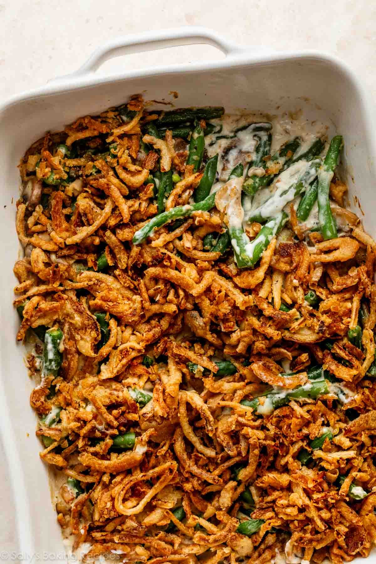 close-up image of green bean casserole with French's crispy fried onions on top.