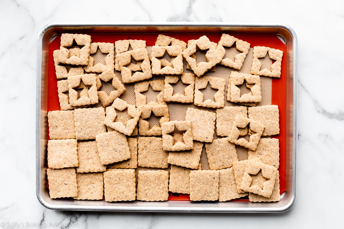 tops and bottoms of hazelnut linzer-style cookie sandwiches