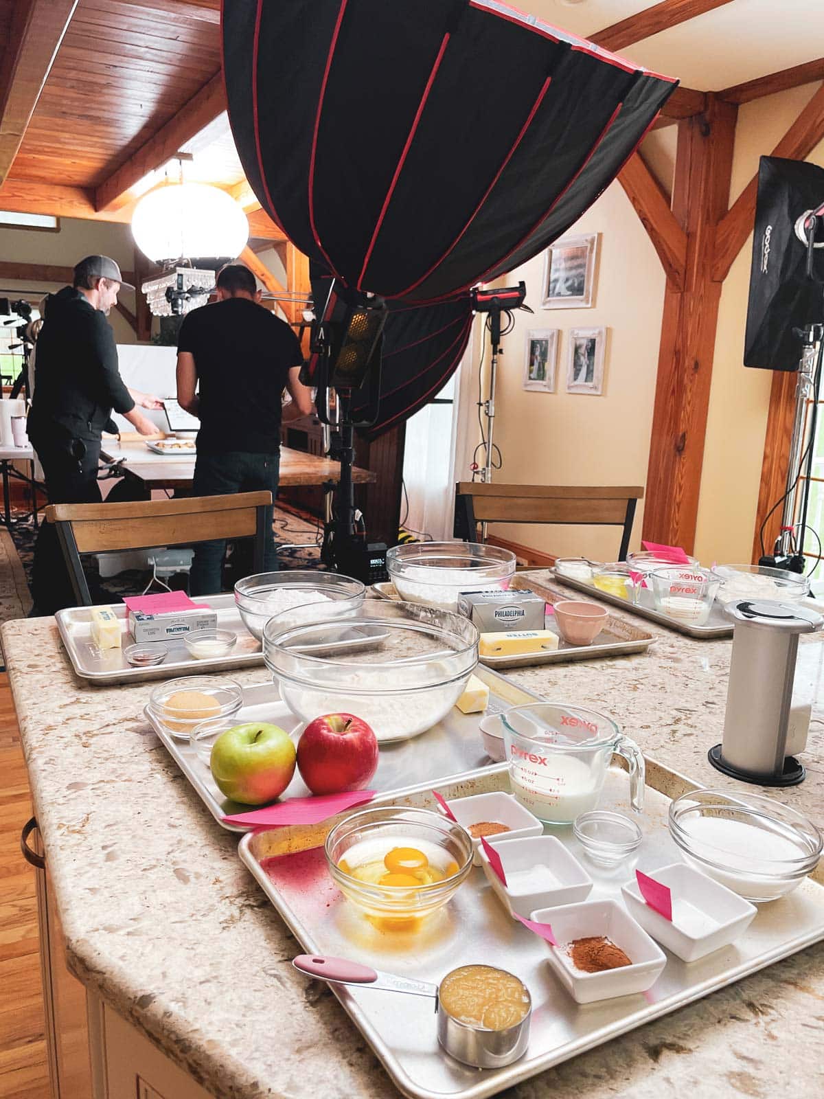 ingredients portioned out in bowls on baking sheets.