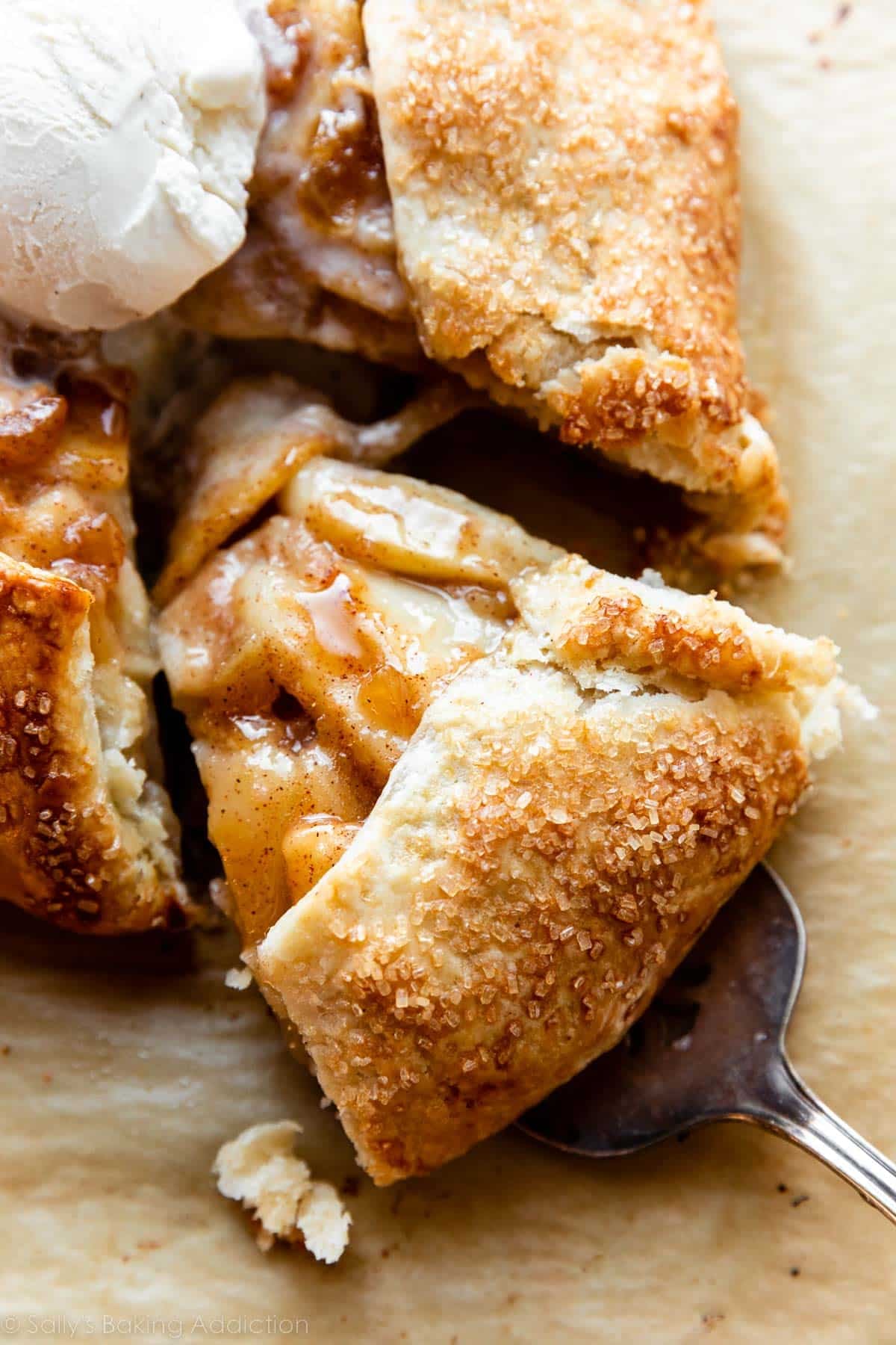 slice of pear galette being removed with pie server.