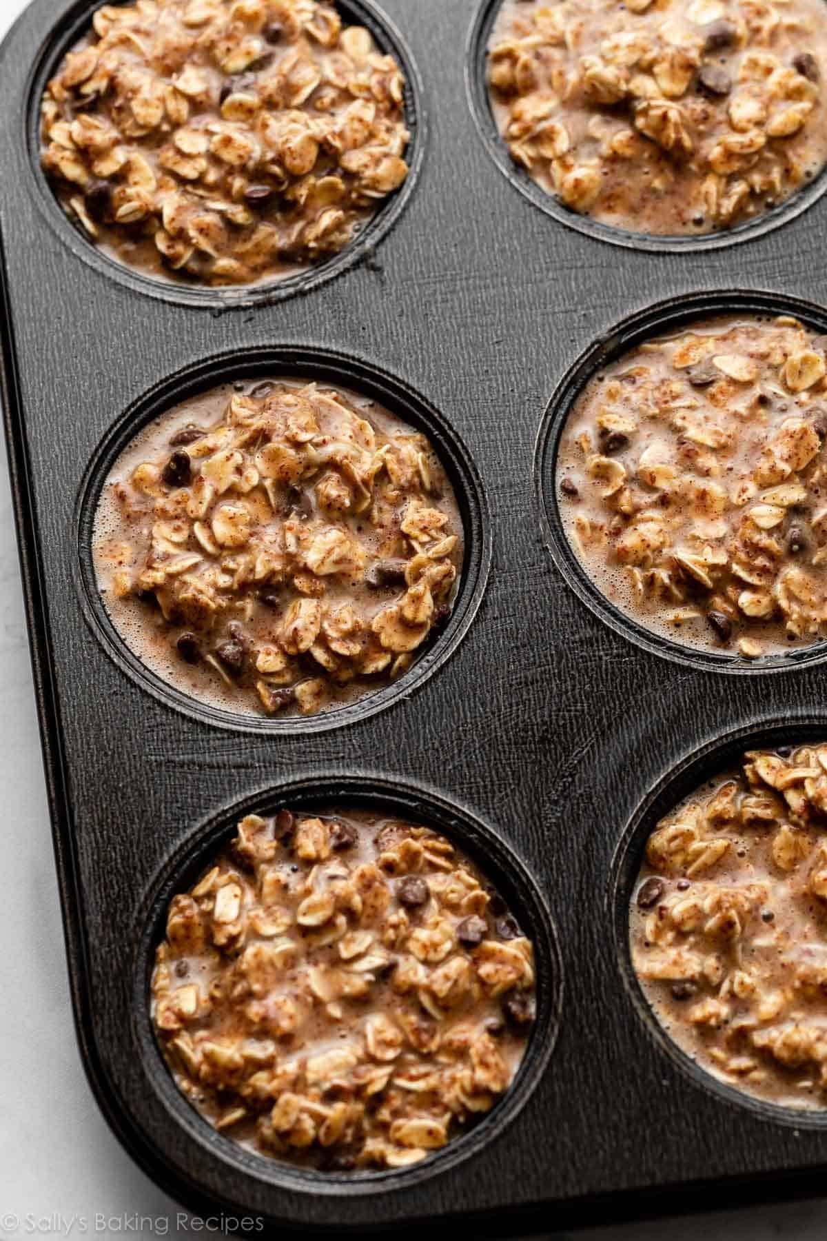 liquidy oat mixture in muffin pan before baking.