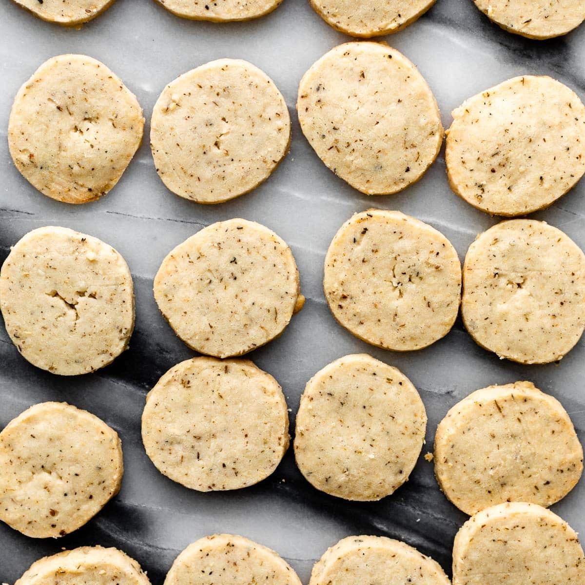 savory slice and bake cookies on marble counter.