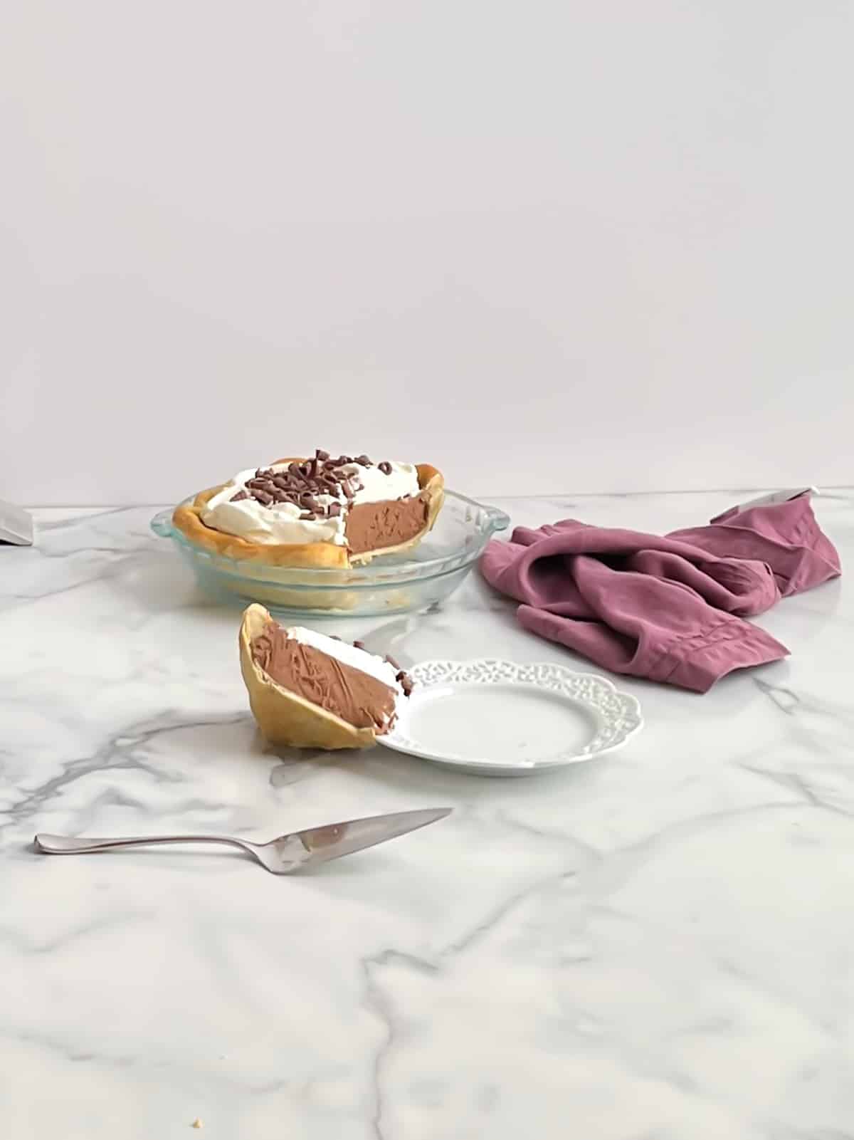 slice of French silk pie fell off of plate.