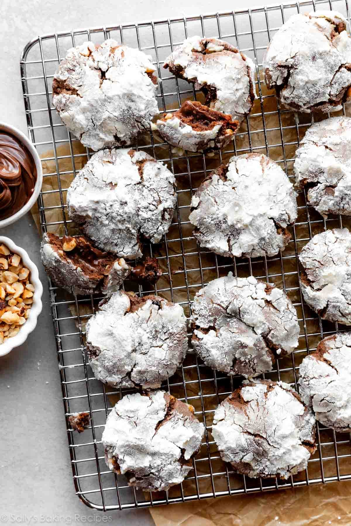 Nutella crinkle cookies on wire cooling rack.