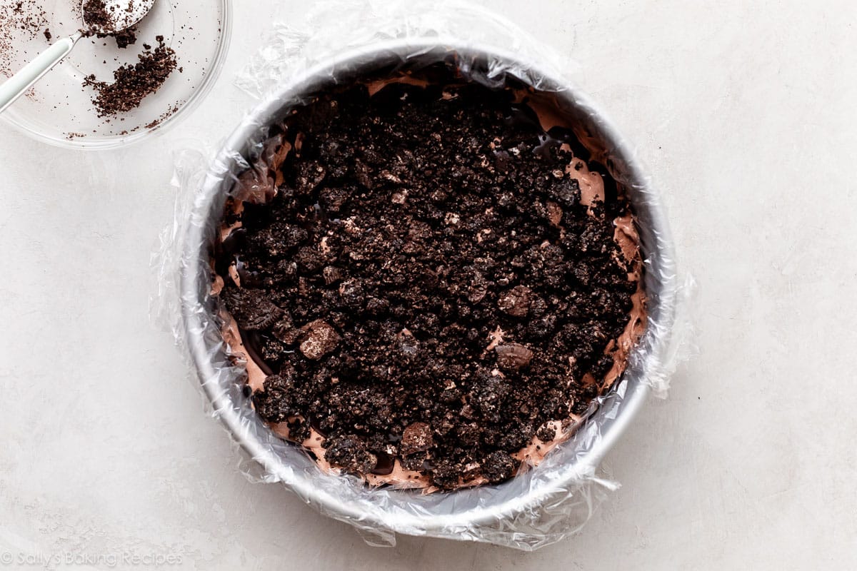 Oreo crunchy pieces in springform pan.