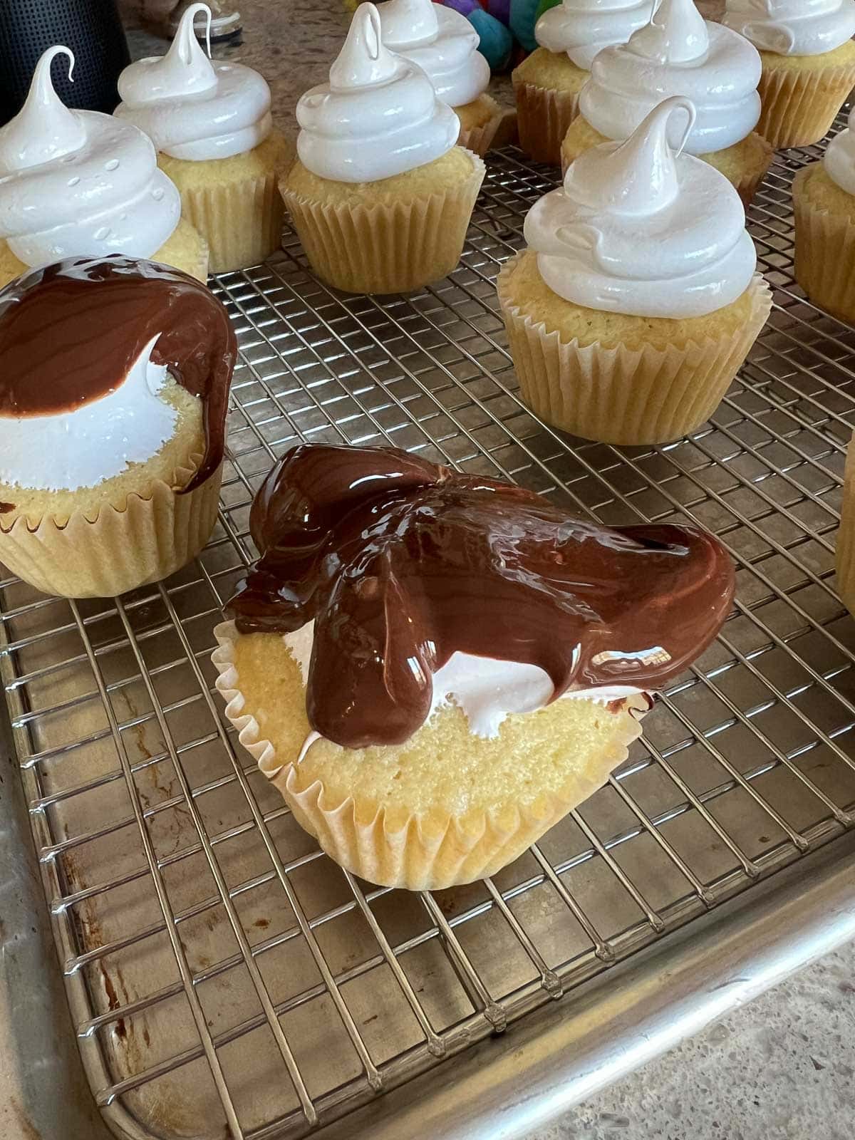 frosted cupcakes with frosting that has melted.