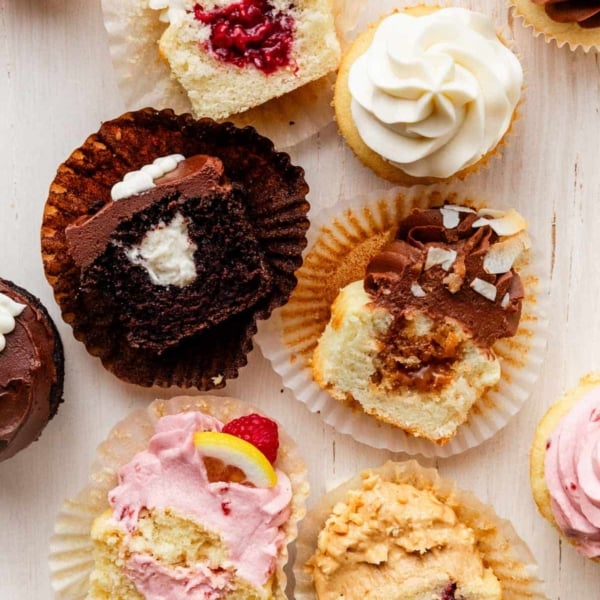 filled cupcakes including different flavors like chocolate, raspberry, lemon, caramel, and peanut butter and jelly.