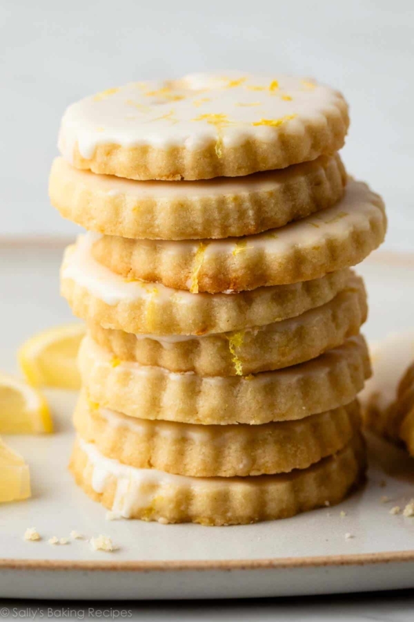 stack of lemon shortbread with icing.