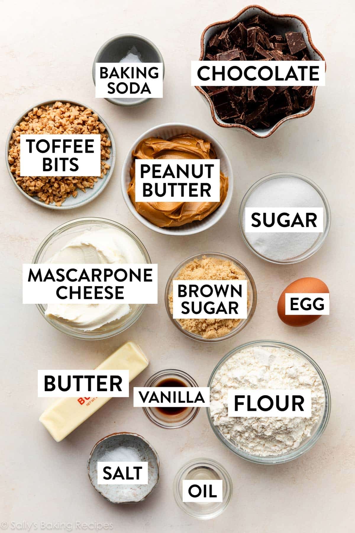 ingredients measured out including chocolate, toffee, sugar, mascarpone cheese, brown sugar, flour, egg, and butter.