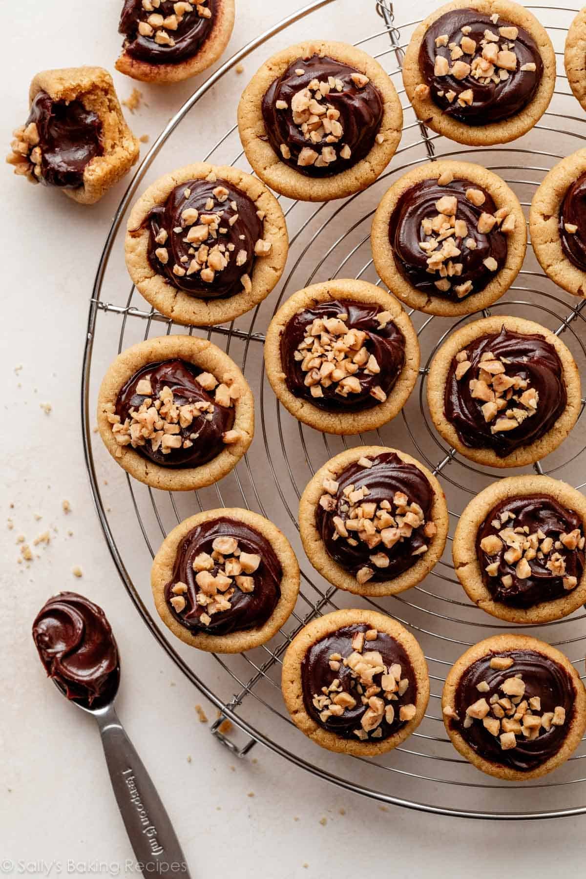 peanut butter fudge cup puddle cookies on circle cooling rack.