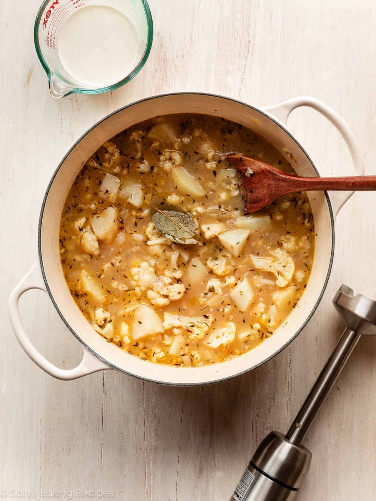 pot of cauliflower potato soup before blending.