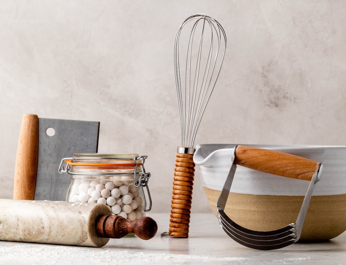wire whisk, rolling pin, bowl, and other baking tools