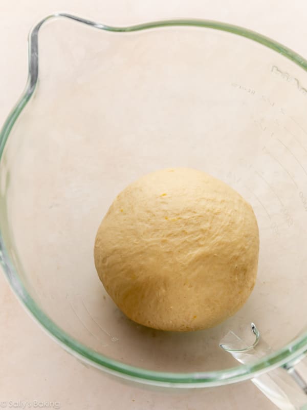 dough in glass bowl.