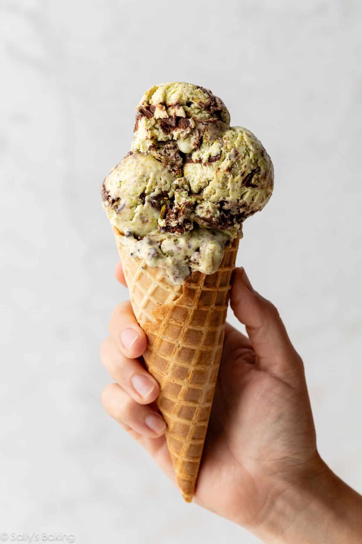 chocolate swirl pistachio ice cream cone.