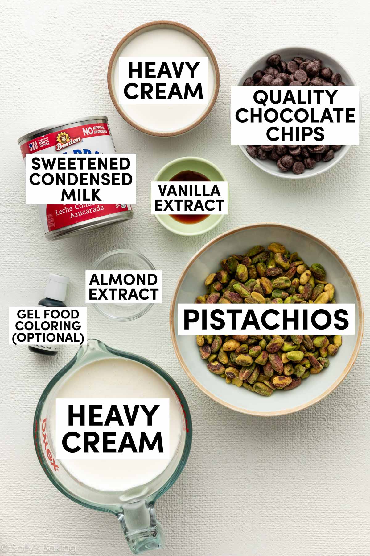 ingredients measured in bowls including chocolate chips, vanilla, almond extract, heavy cream, and sweetened condensed milk.
