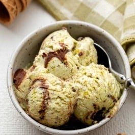 bowl of homemade no-churn pistachio ice cream.