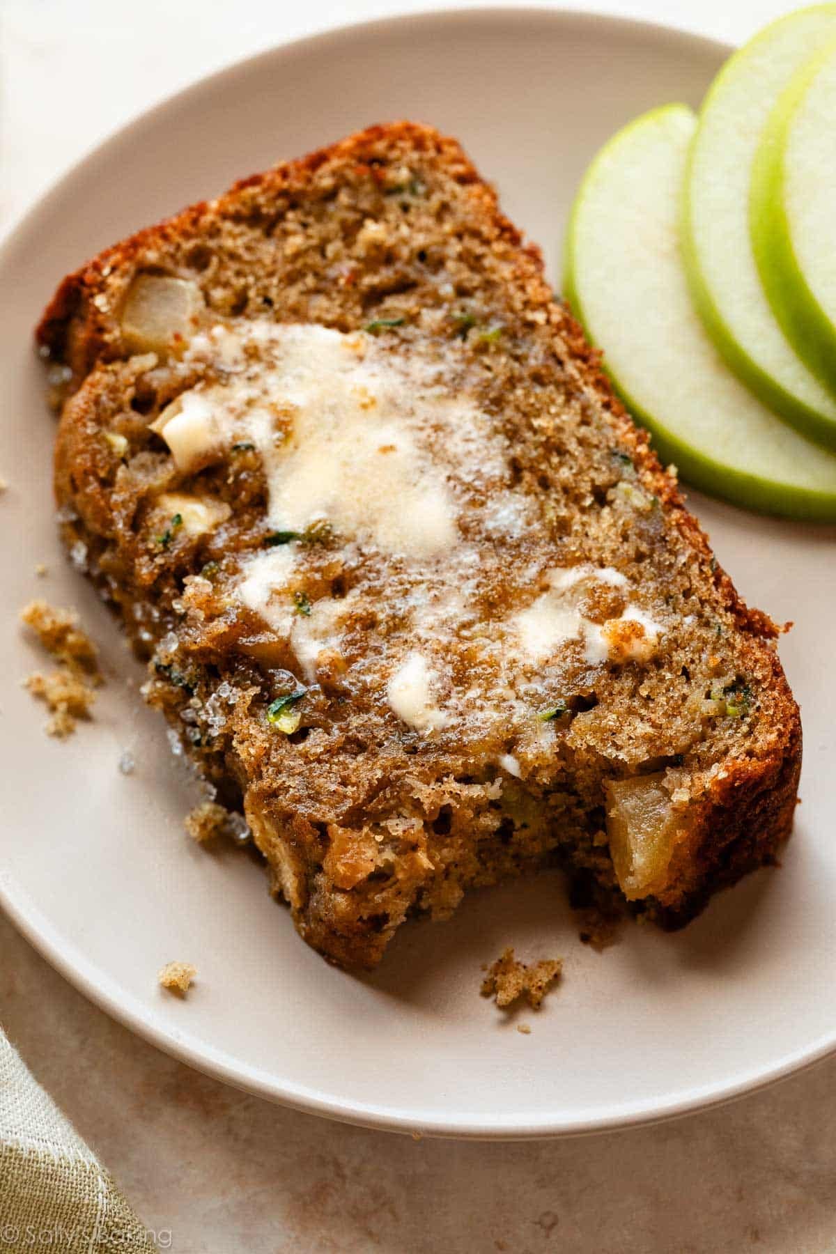 apple zucchini bread with bite taken out.