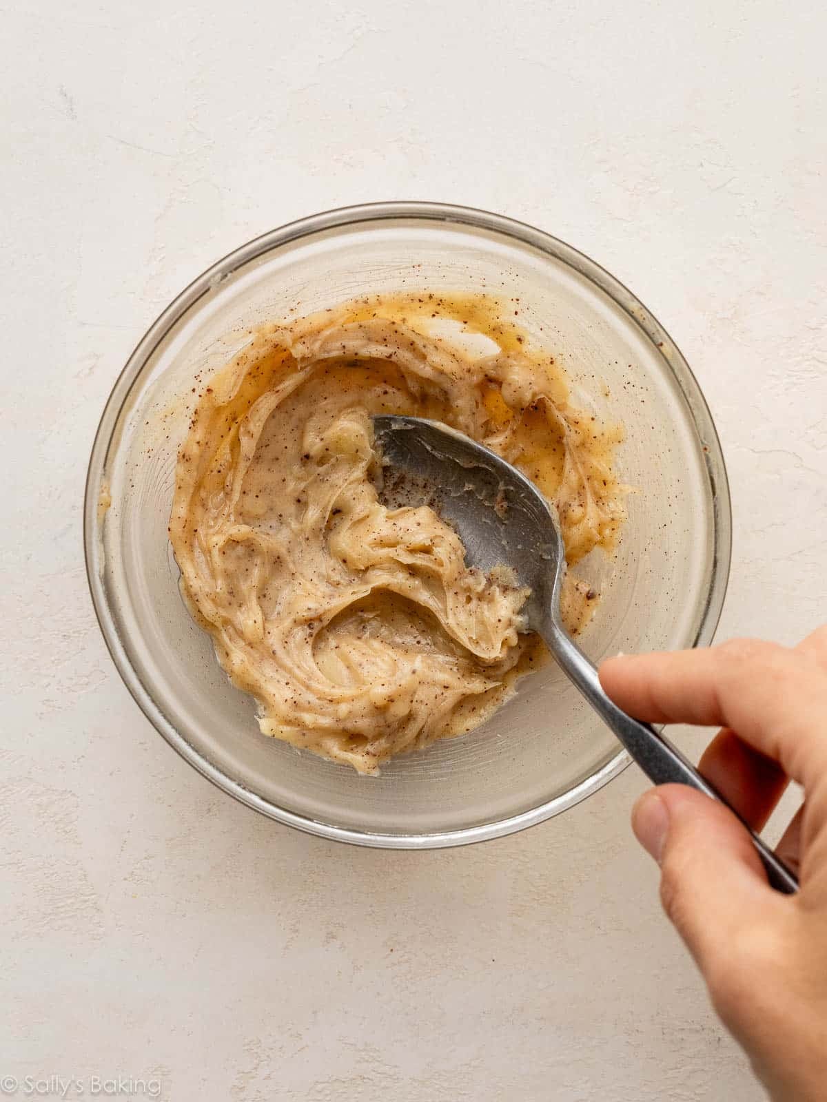 spoon stirring solid browned butter.