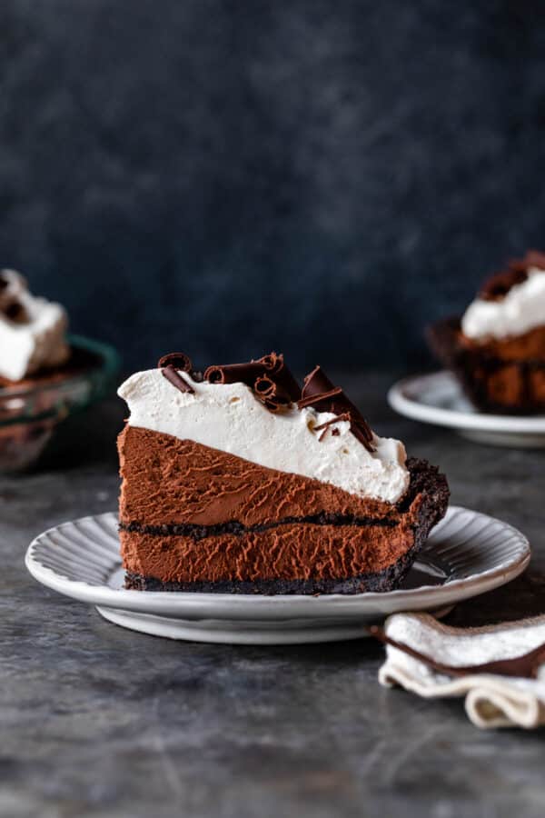slice of chocolate mousse pie on gray plate.