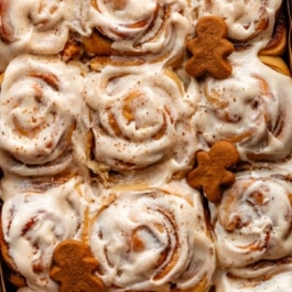 gingerbread cinnamon rolls with spiced cream cheese frosting.