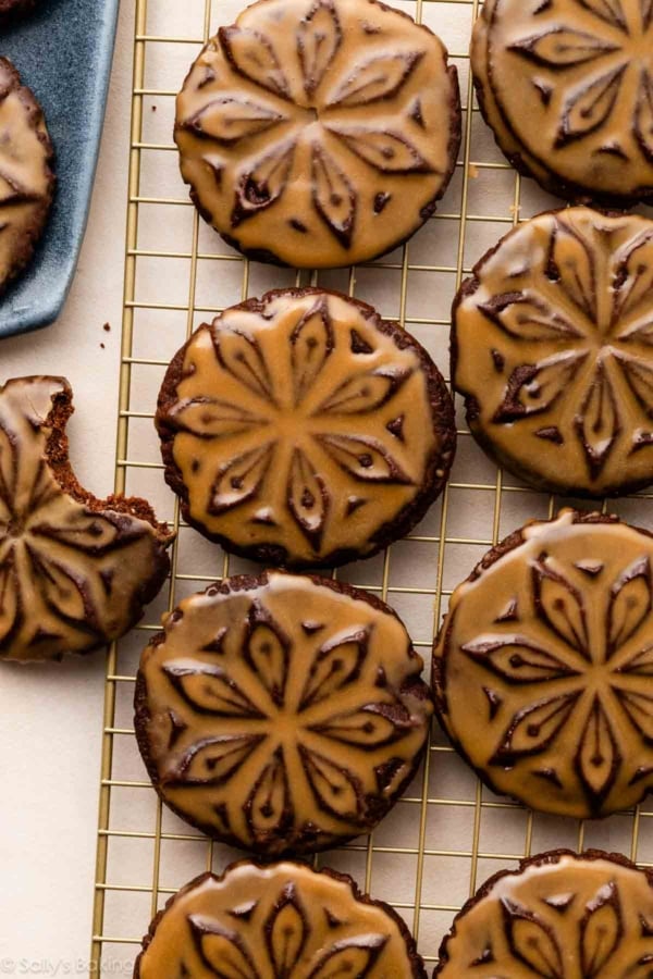 chocolate stamped cookies with icing.