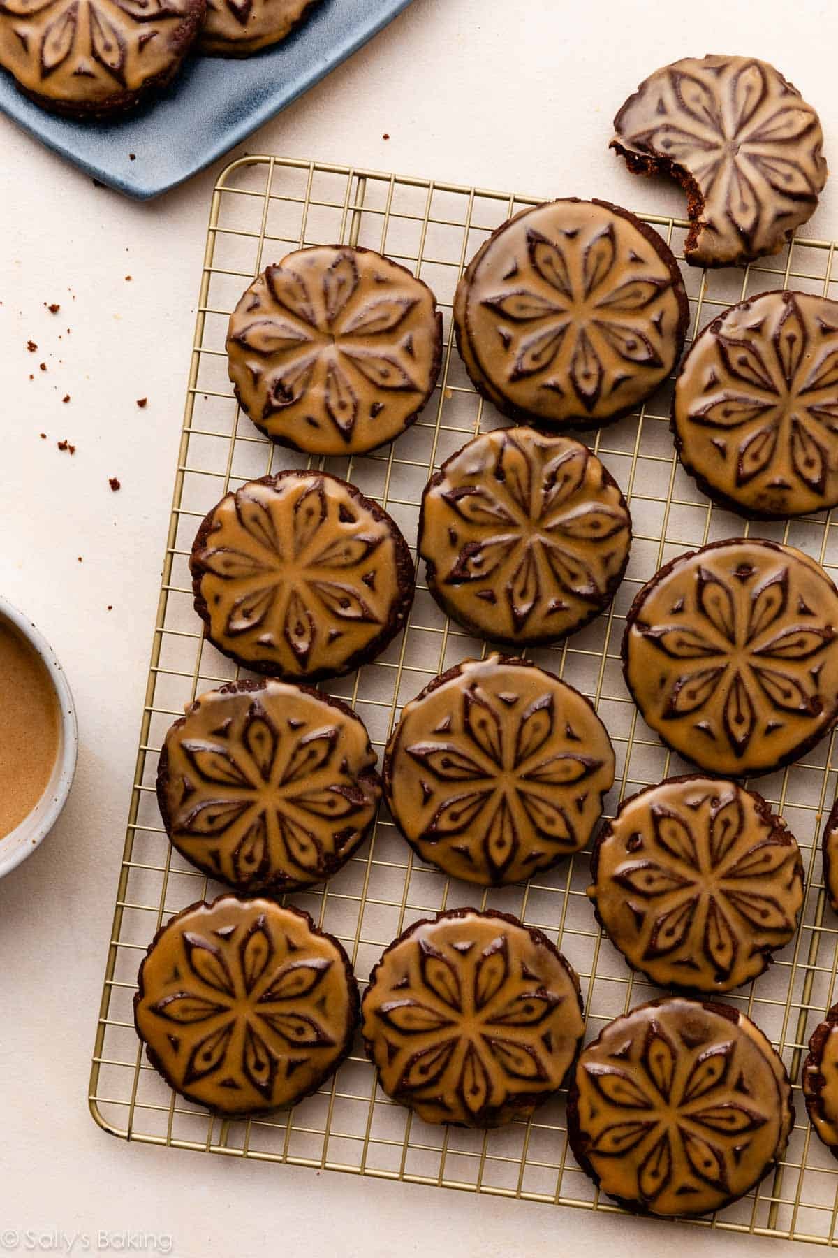 stamped chocolate espresso cookies with icing.