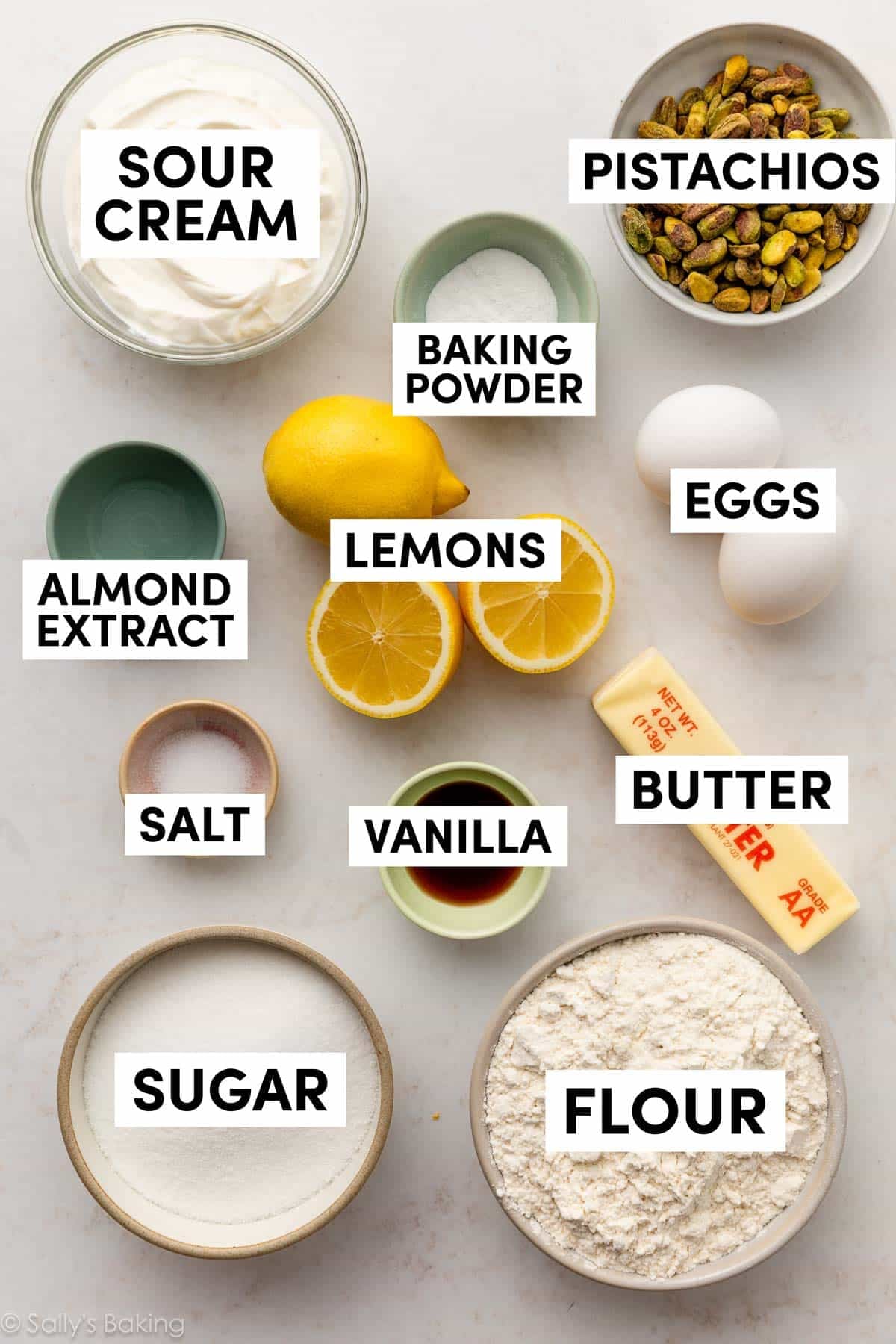ingredients in bowls including sugar, flour, butter, vanilla, and salt.