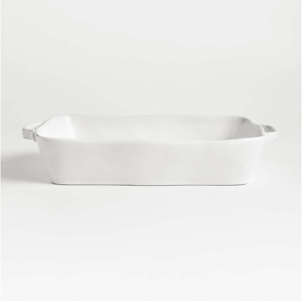 large white ruffled ceramic baking dish.